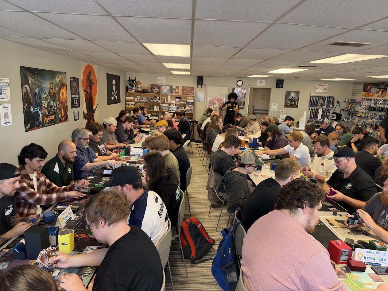 Packed tournament room at the 2026 Extra Life Pauper event